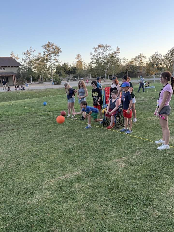 Campers playing field games together